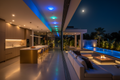 Luxury rental property with premium smart LED lighting system indoors and outdoors at night